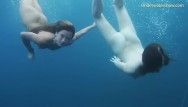 Underwater erotic bare show with two sexy lesbos